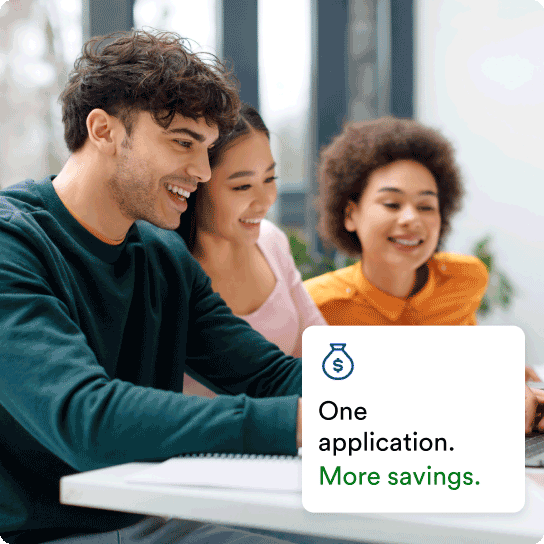 Young man and two young women using a laptop