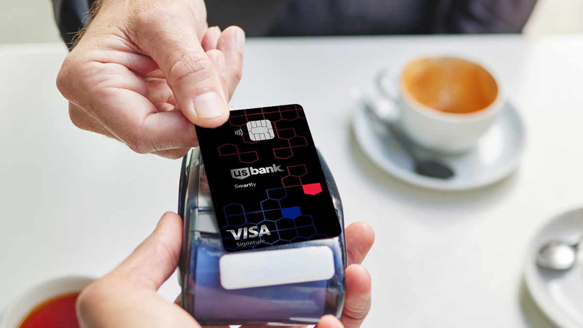 Credit card being tapped on a payment terminal.