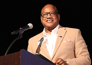 Man speaking at podium