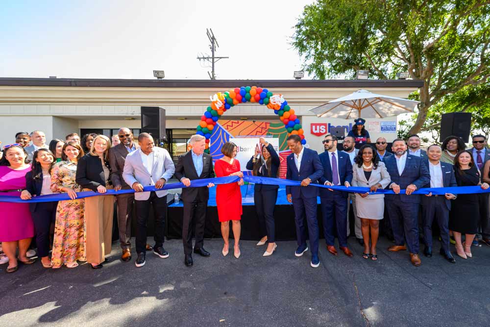 Group of people at a ribbon-cutting ceremony