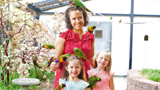 A woman and two young girls enjoy Turtle Bay Exploration Park, a recipient of the Community Possible grant.