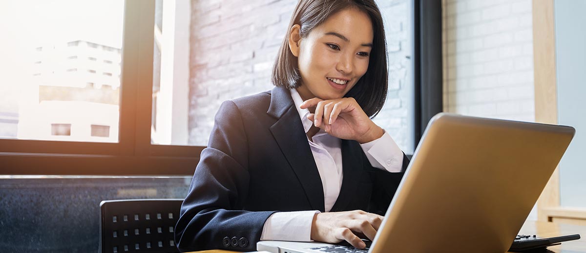 Professional woman making a U.S. Bank wire transfer international