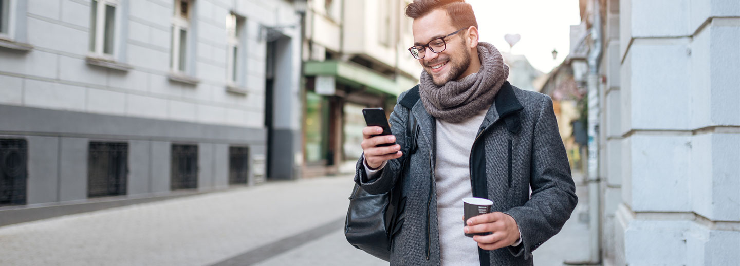 man looking at phone