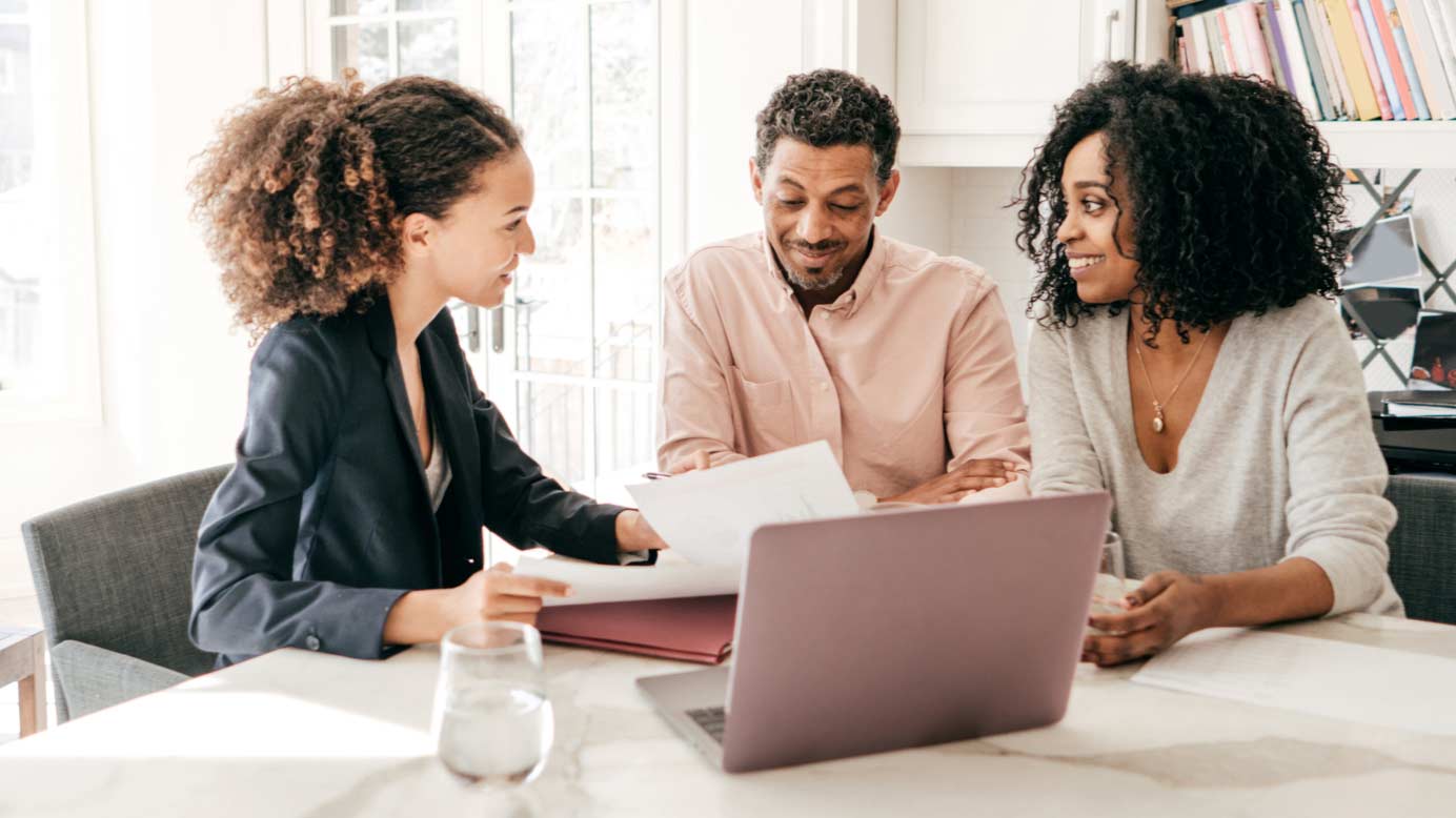 Couple meeting with their financial advisor