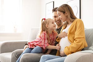 Young family on a sofa