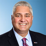 headshot of Naveen Sharma